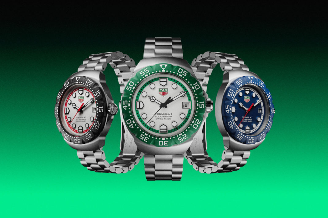 Watches on green background