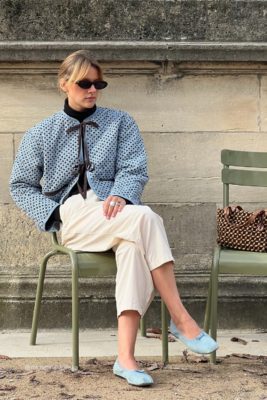 Woman wearing blue joy jacket
