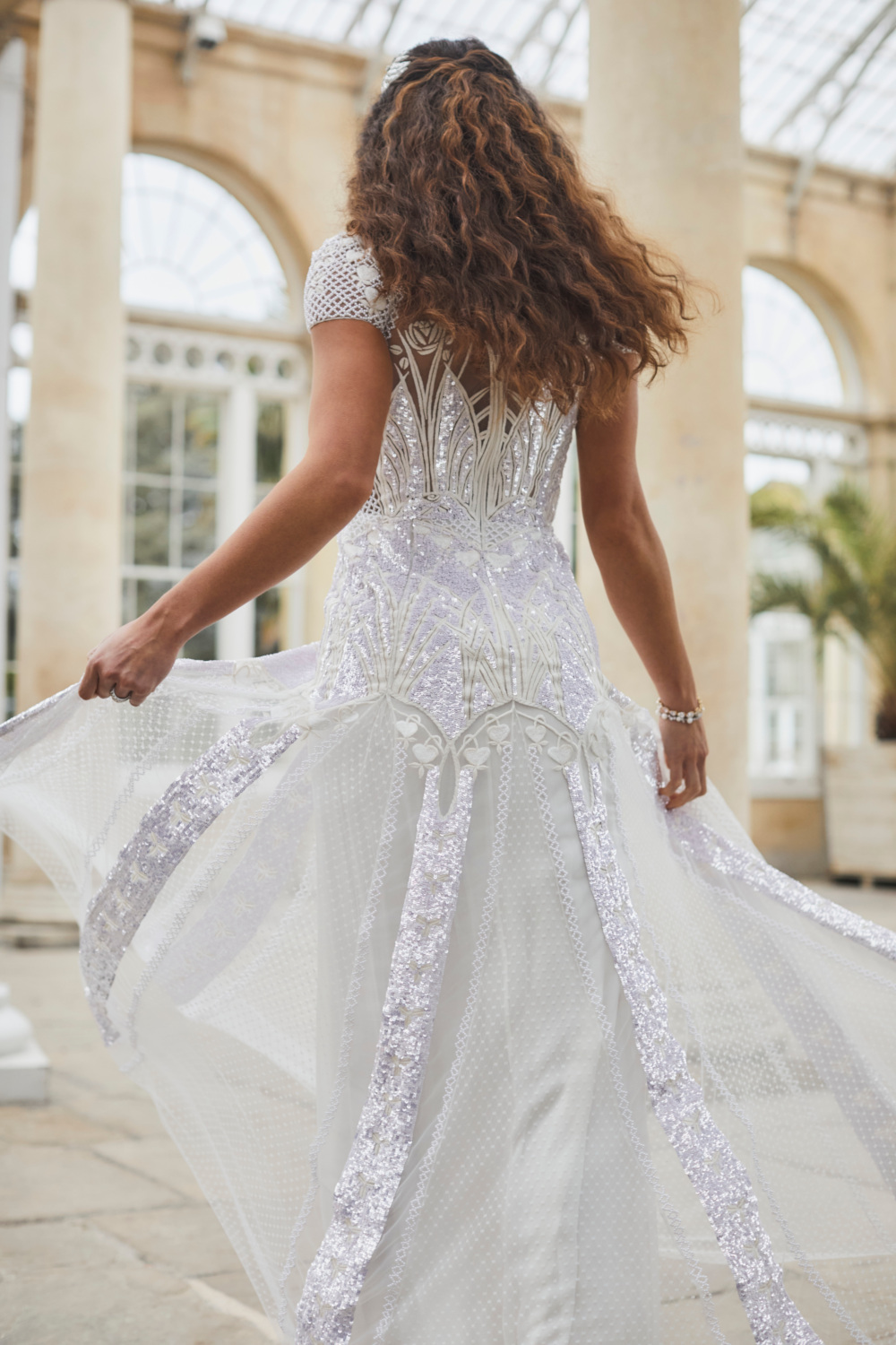 Woman running in white dress