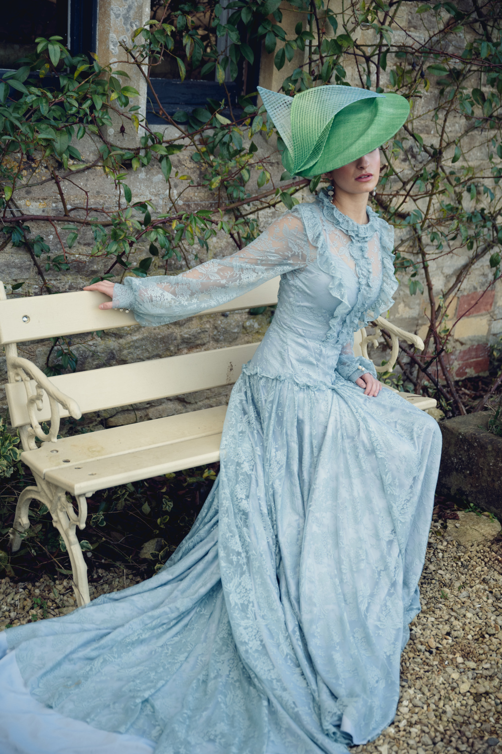 Woman in blue dress and green hat | Good Clothes Show London lookbook
