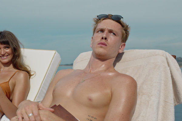 Harris Dickinson in Triangle of Sadness.