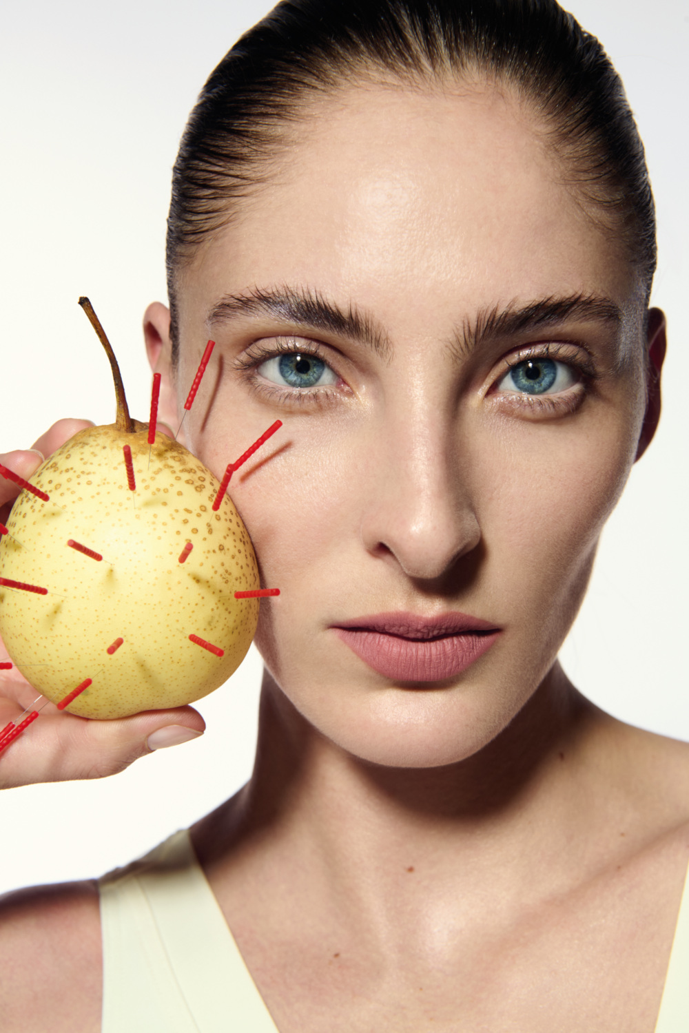 Woman holding pear