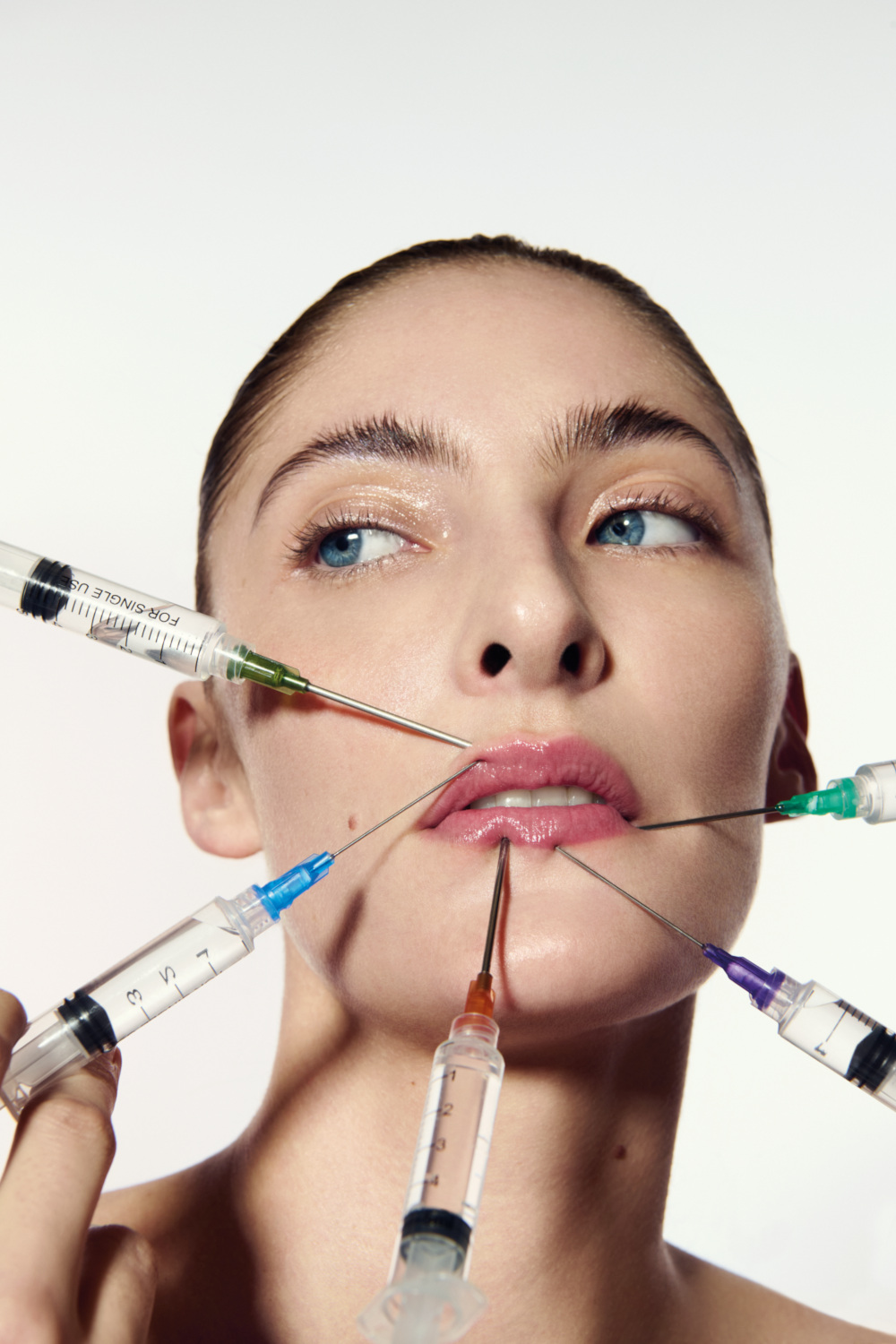 Woman surrounded by needles | undetectable injectables