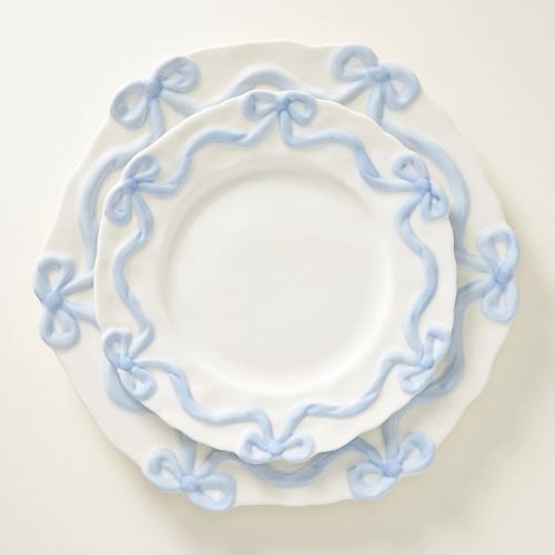 Cream side plates with blue bow design