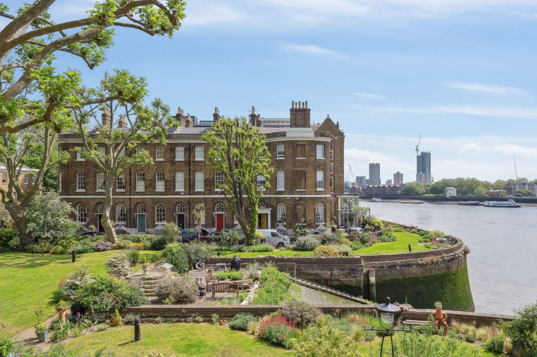 Riverside view of red brick Georgian townhouse