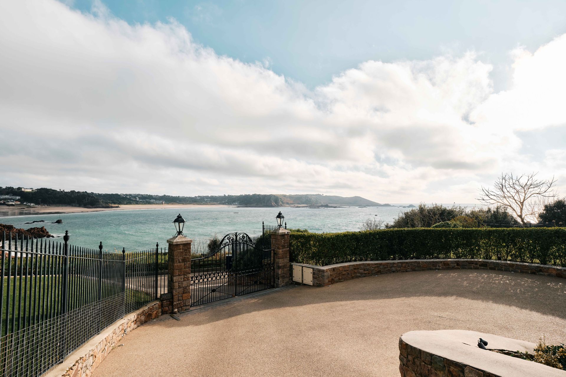 Circular gravel driveway with sea views