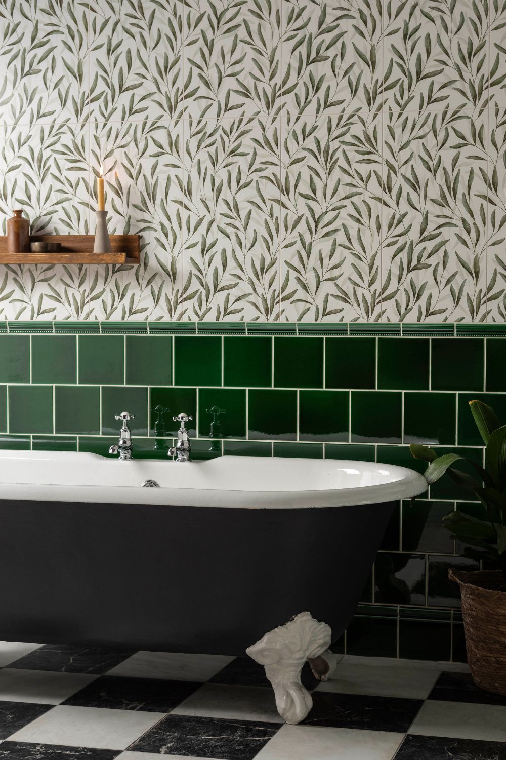 Bathroom with botanical wallpaper, emerald green tiles and checkerboard flooring