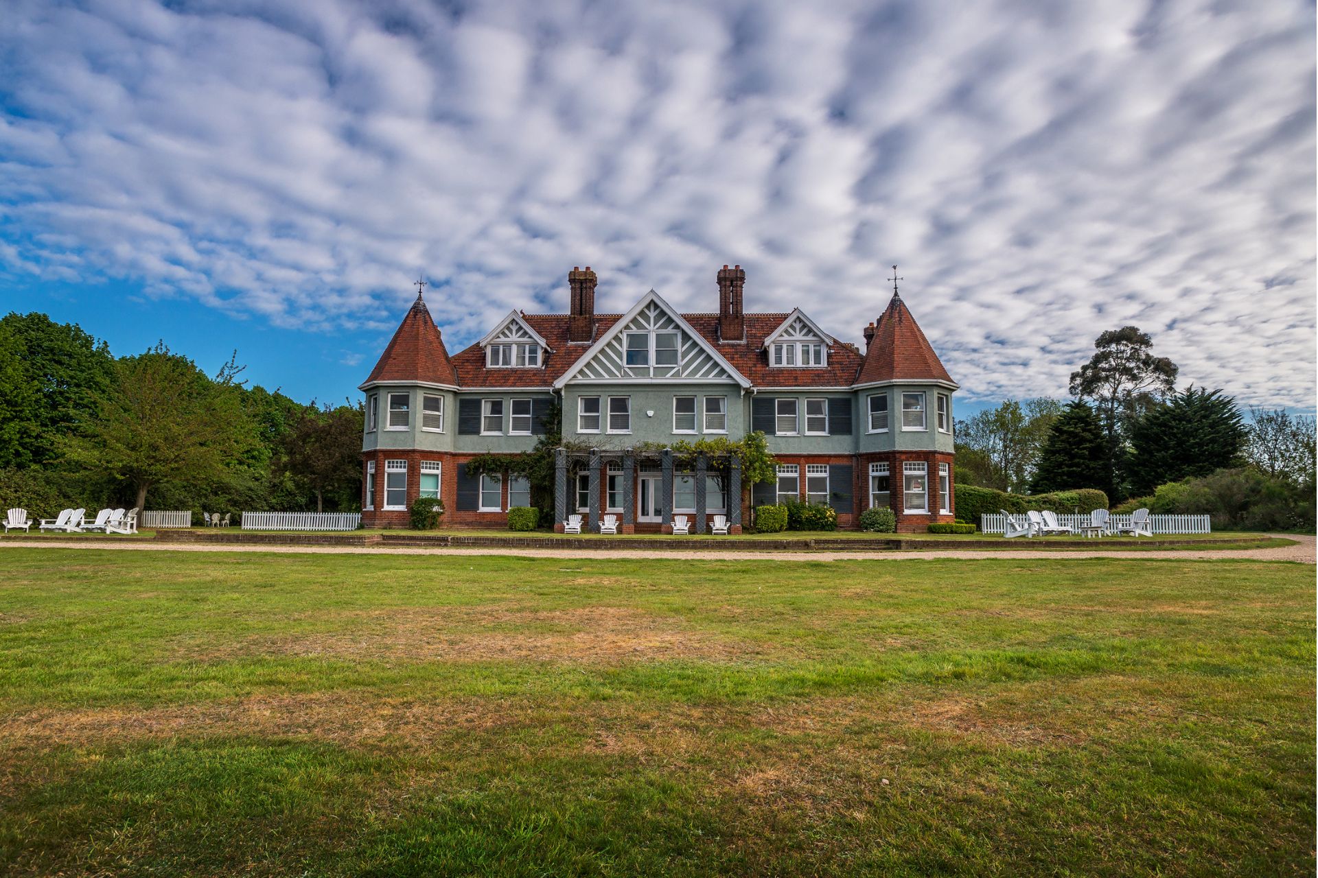 Large Edwardian home with lawn in front