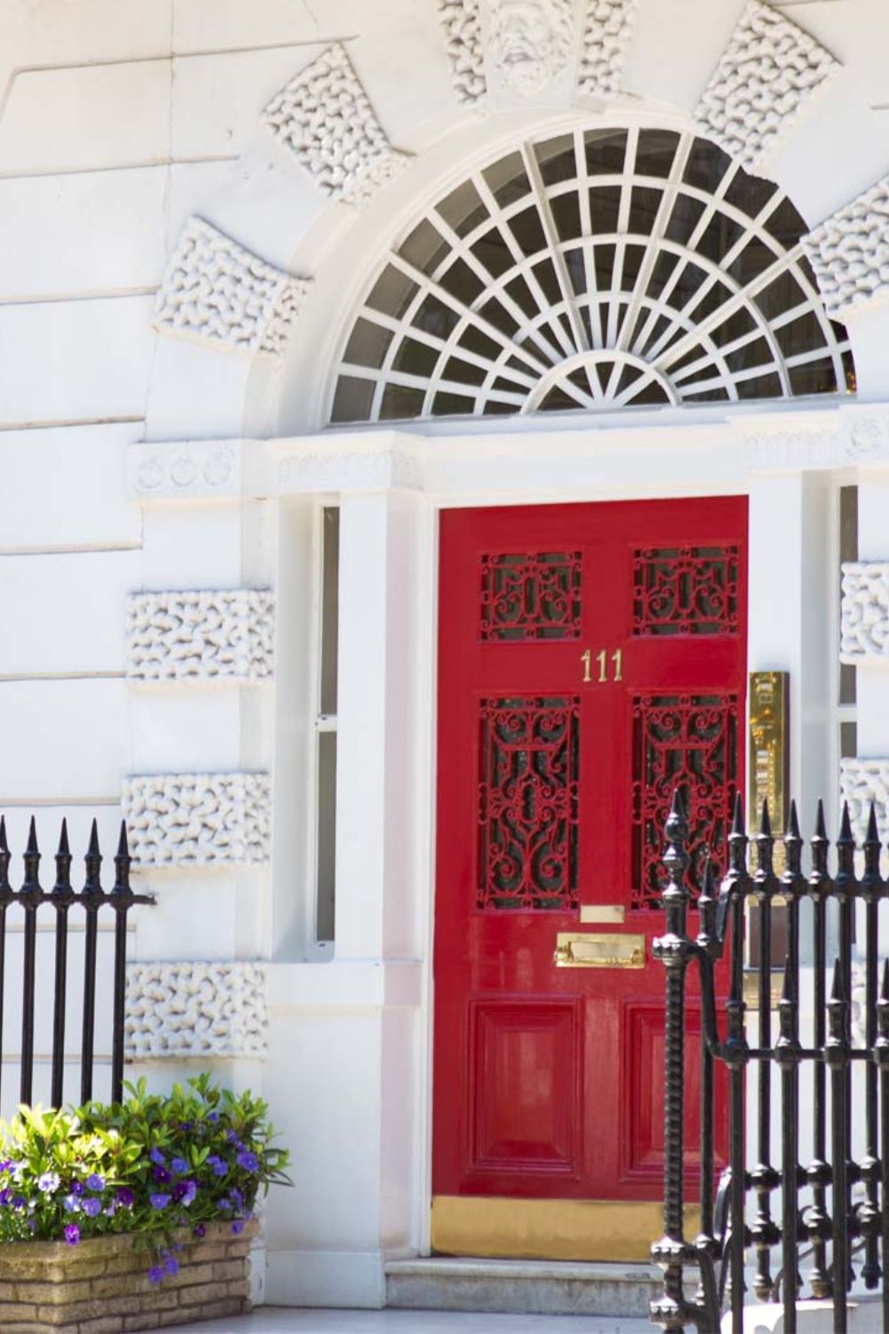 Exterior of Harley Street clinic with red door