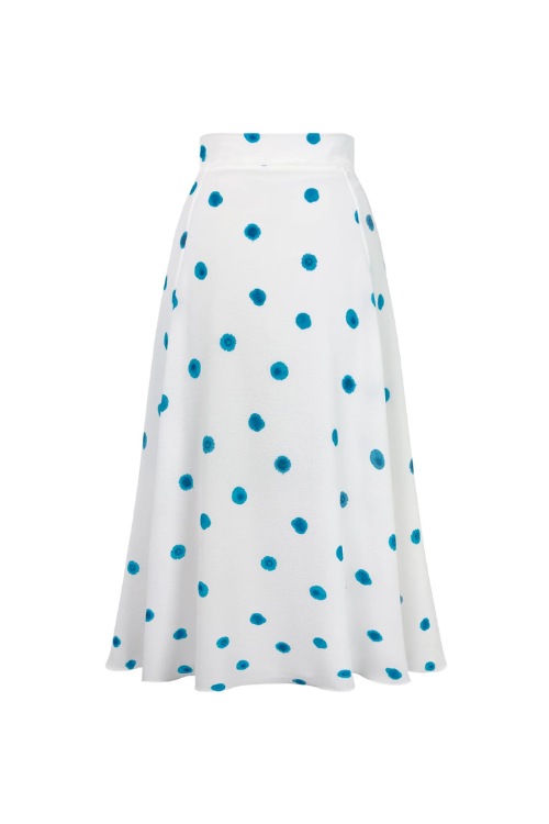 White skirt with blue polka dots