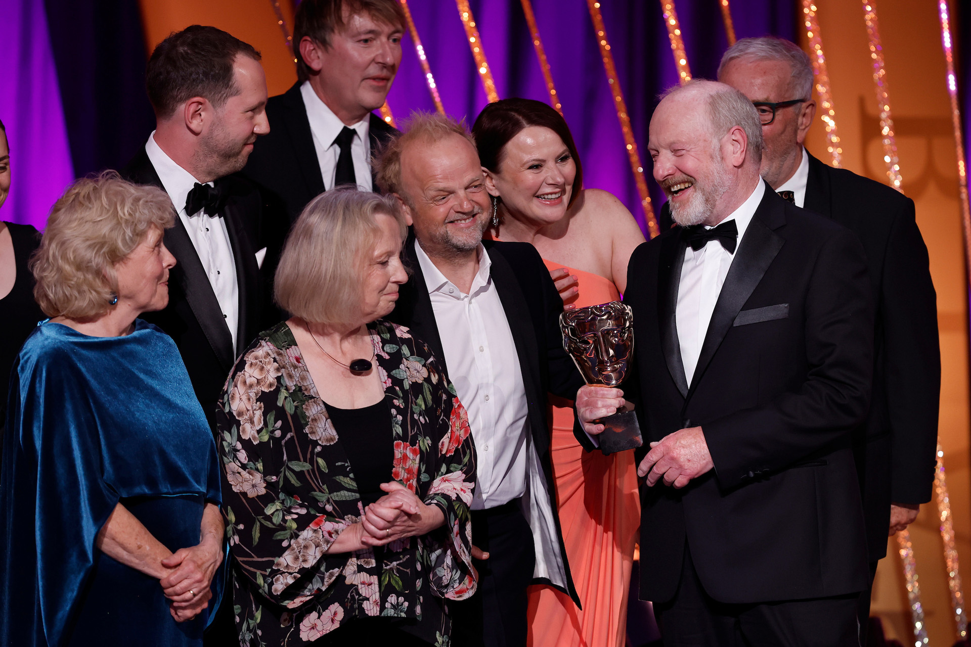 Toby Jones, Monica Dolan and Sir Alan Bates on stage with the Limited Drama Award for 'Mr Bates vs The Post Office' during the 2025 BAFTA Television Awards with P&O Cruises Ceremony