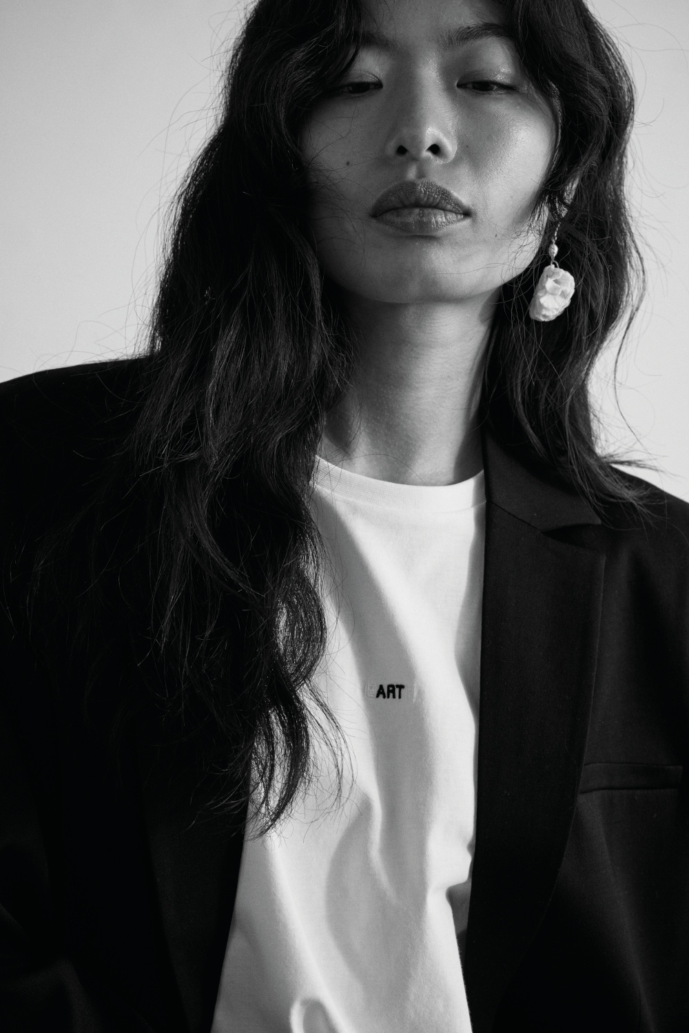 Woman in blazer and t-shirt