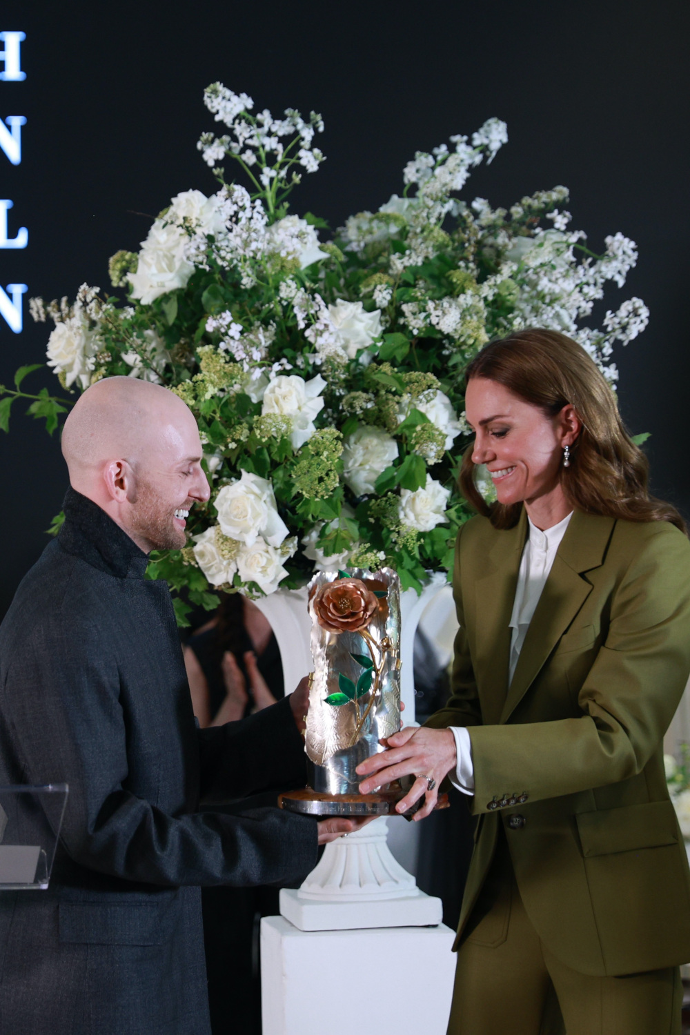 Kate Middleton Presents Designer Patrick McDowell With The Queen Elizabeth II Award