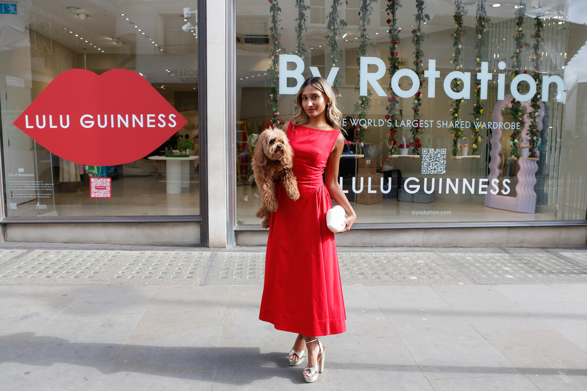 By Rotation Founder Eshita Kabra-Davies Holding BR x Lulu Guinness, outside the store