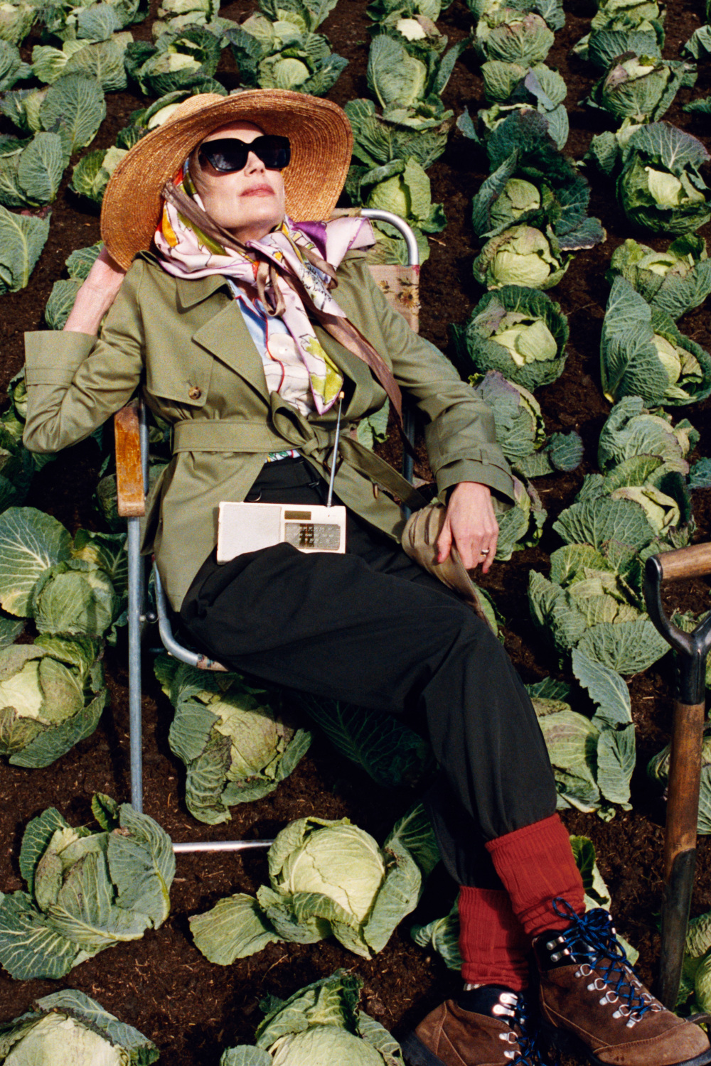 Woman lounging on cabbage patch | Elizabeth McGovern for Burberry