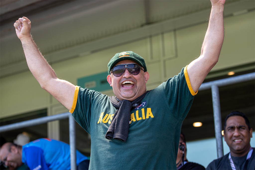 A fan celebrating at a sports match