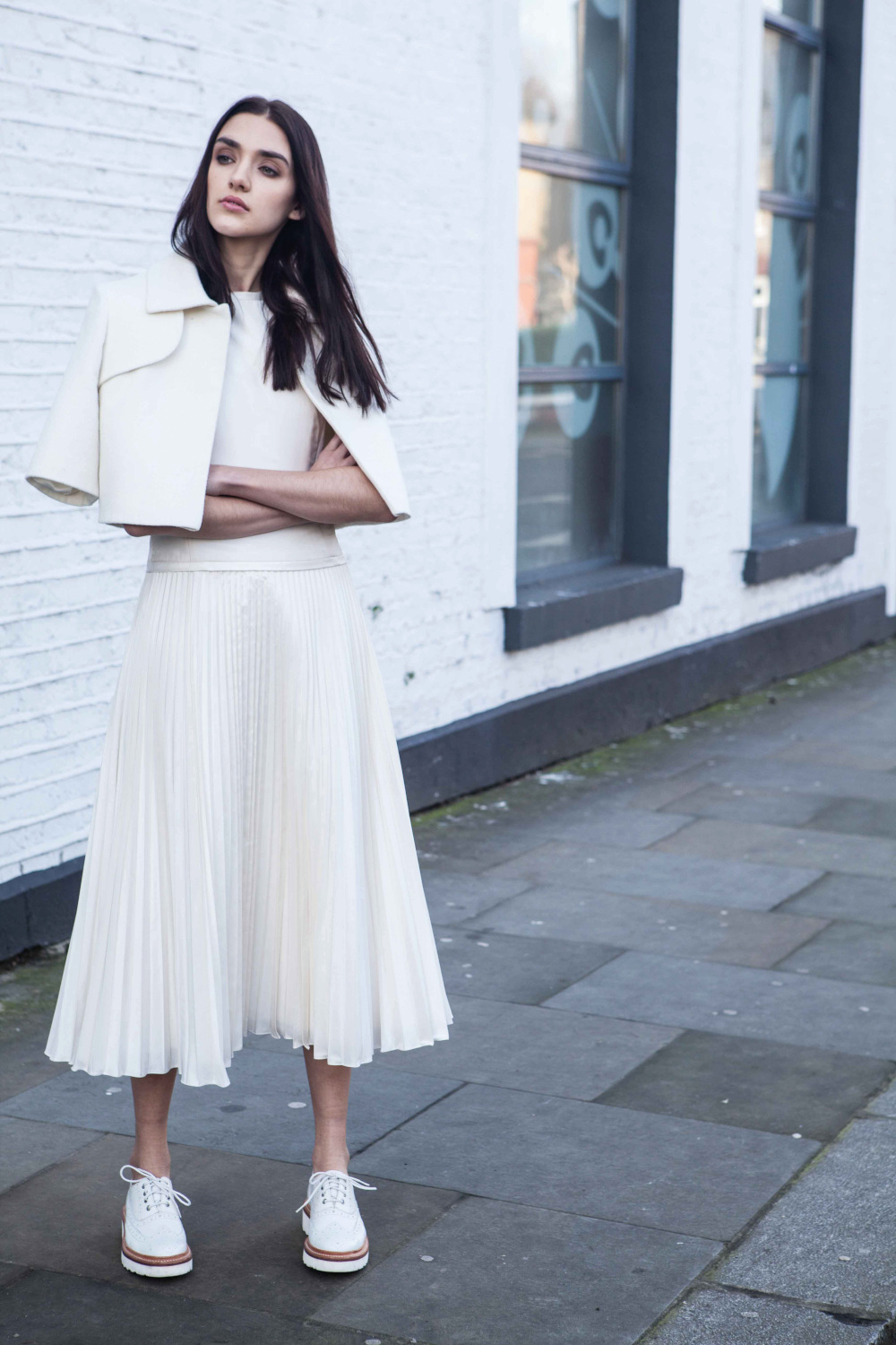 Woman in white outfit