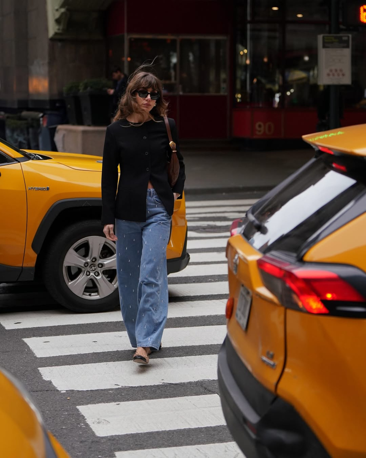 Woman walking across road