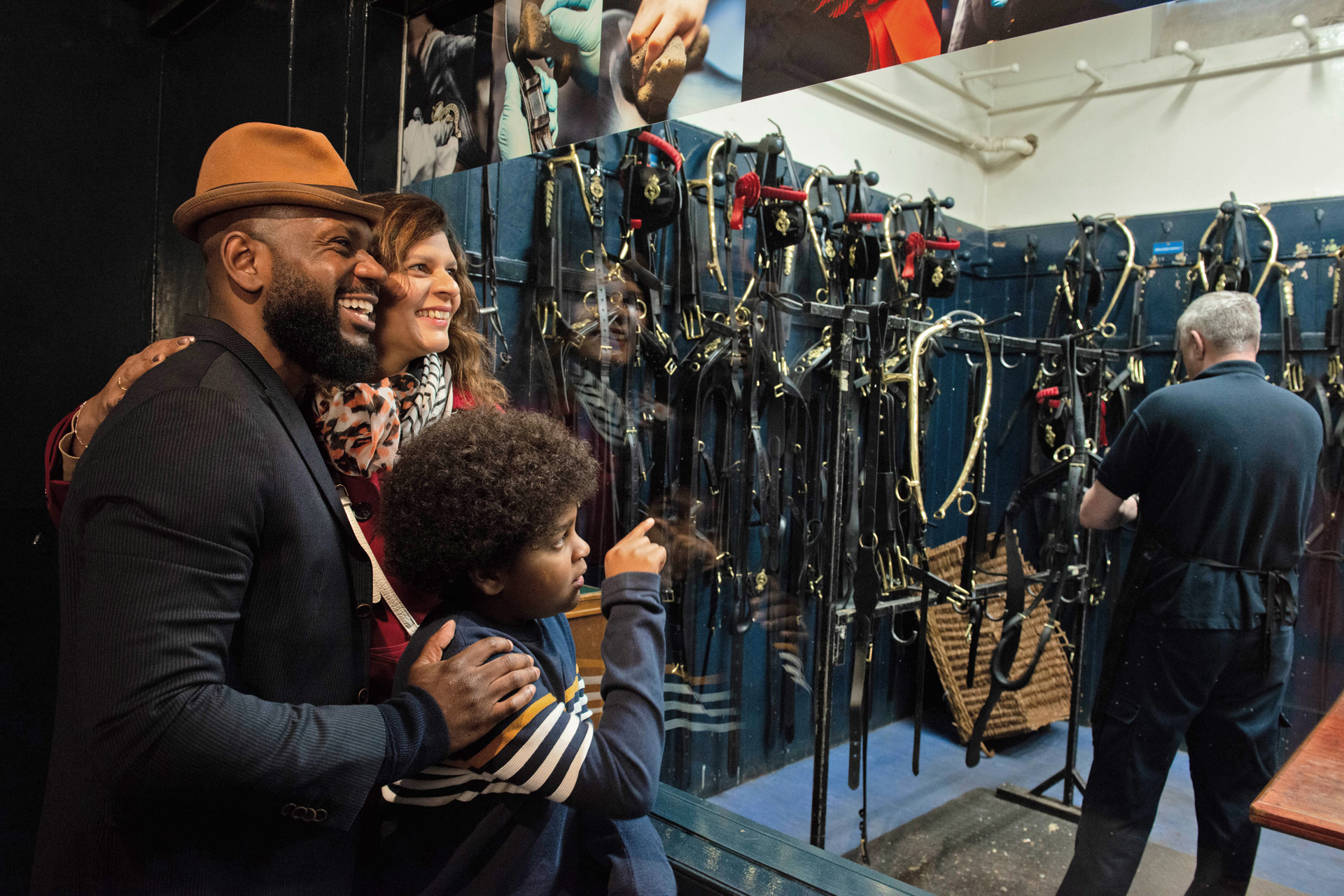 A family looking at horse tack
