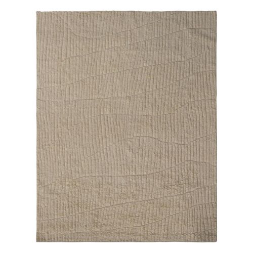 Woollen rug with tufted ridges in ivory