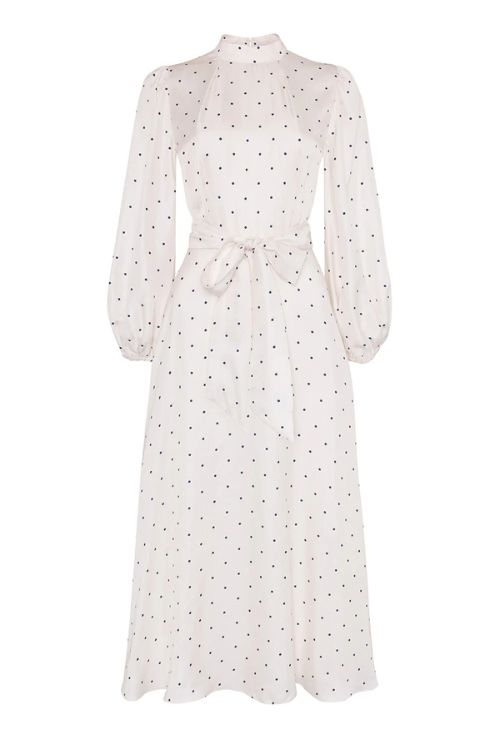 Black and white polka dot dress with long sleeves and a tie waist
