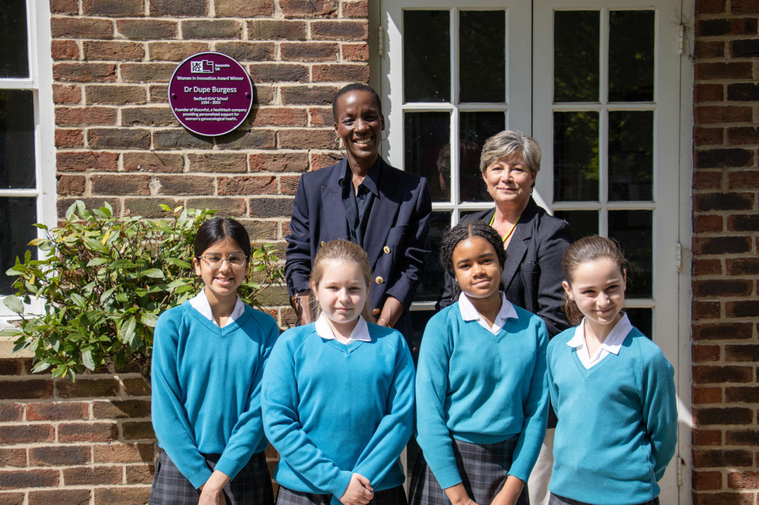 Dr Dupé Burgess innovation award with Bedford Girls Students