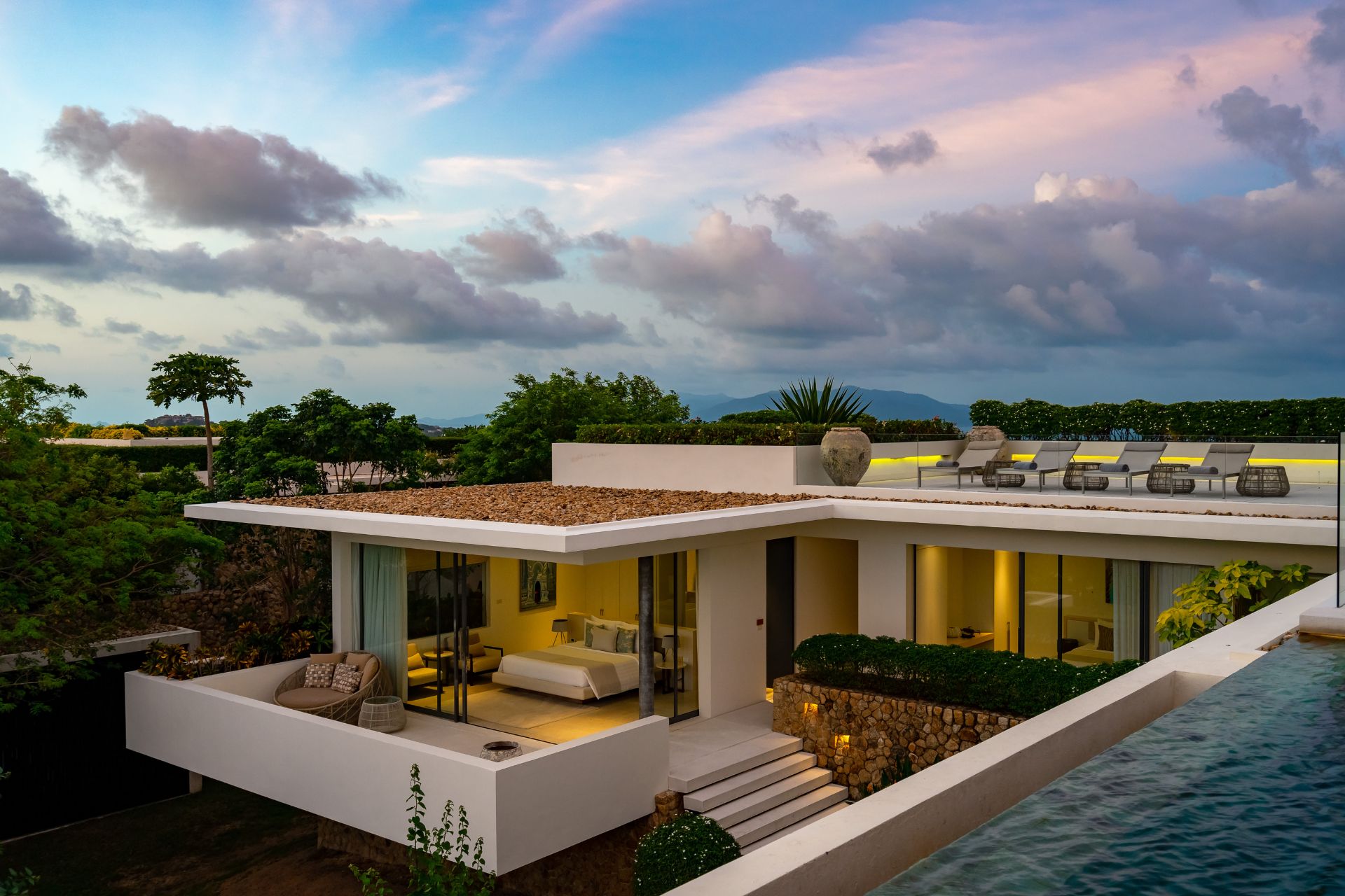 Modern villa with infinity pool, roof deck and bedroom with private terrace