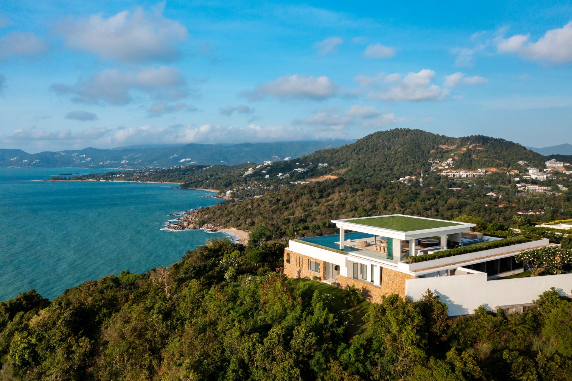 Hillside villa with rooftop pool and sea views