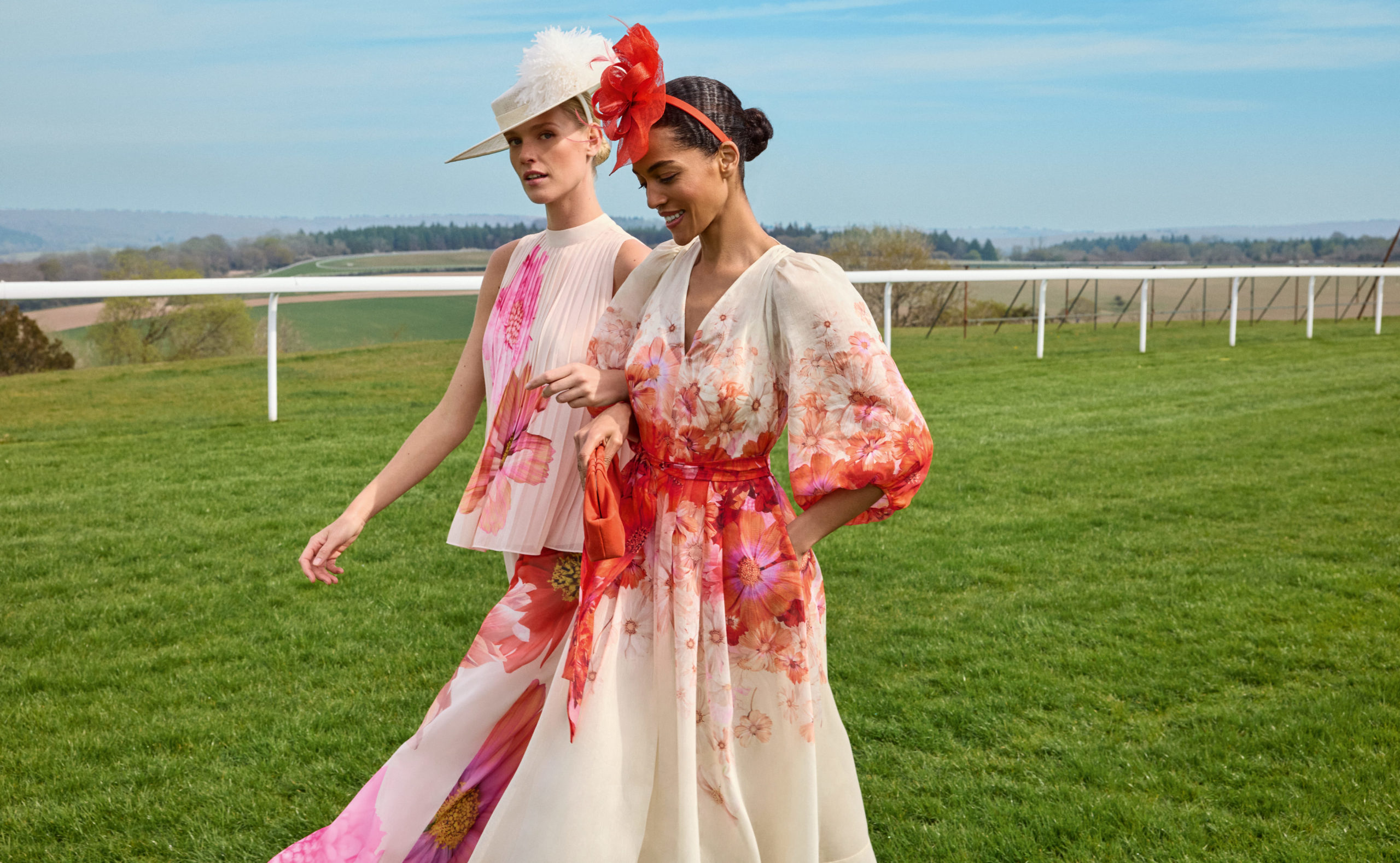 Women walking on racecourse