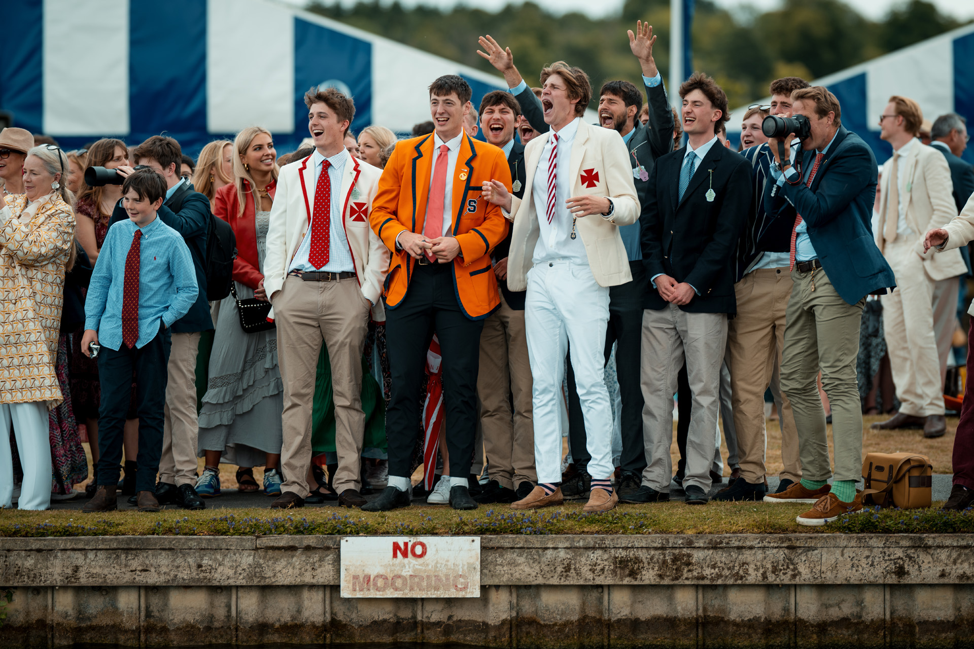 Male spectators in vibrant blazers at Henley Royal Regatta