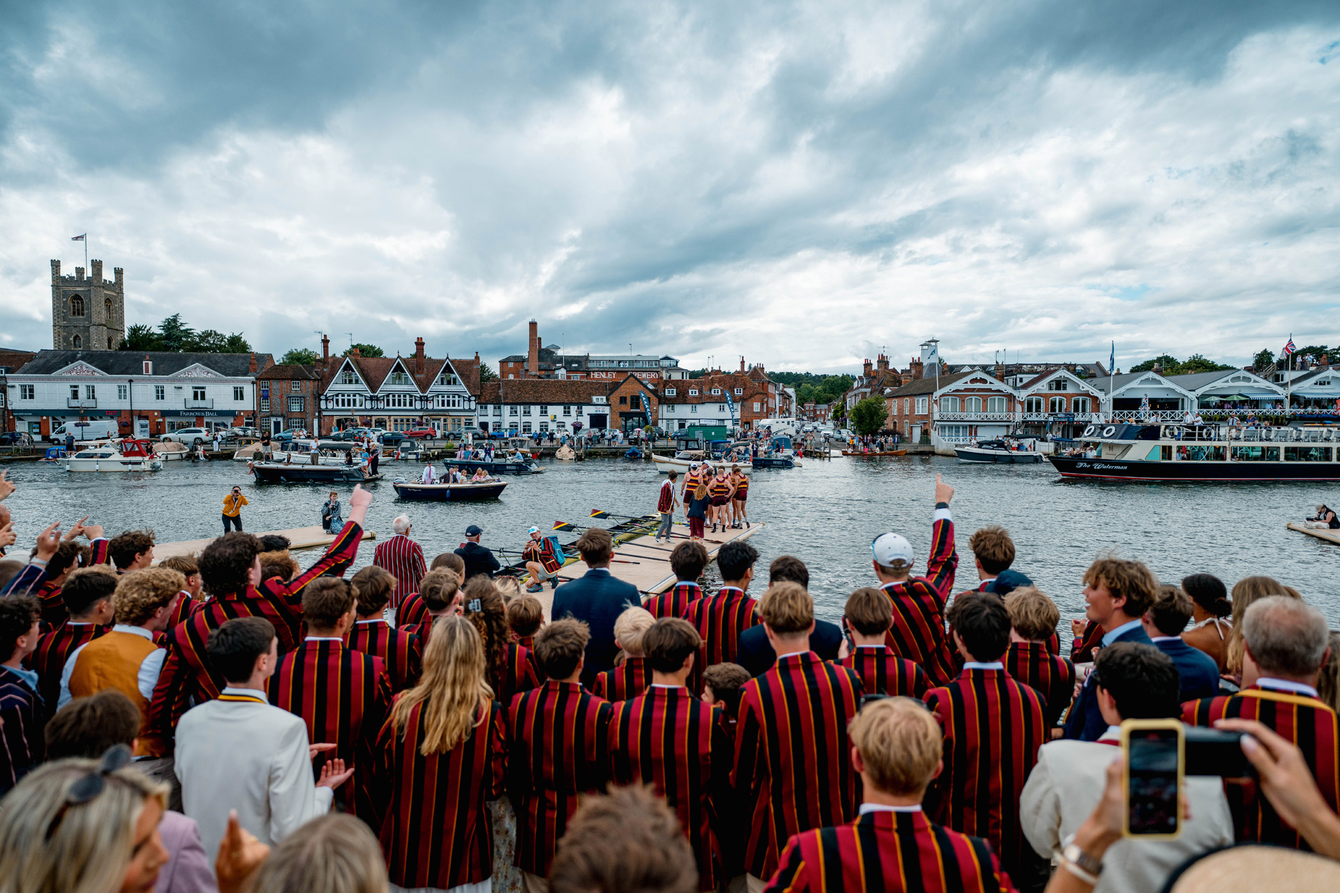 Crowds and rowers at Henley Royal Regatta