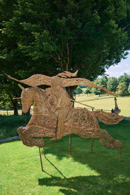 A sculpture of the Burberry logo