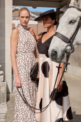 Women dressed up for Goodwood Racecourse