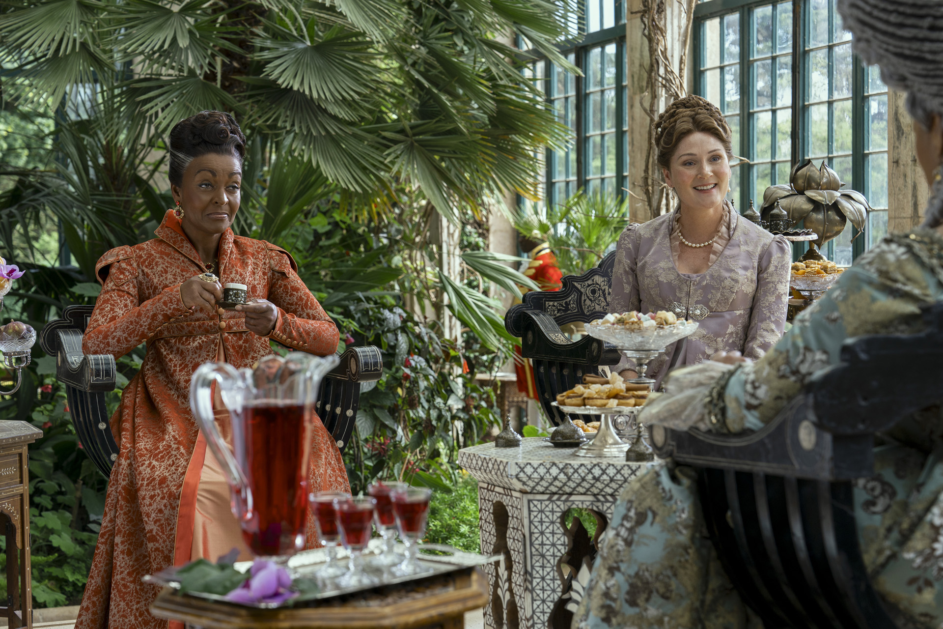 Adjoa Andoh as Lady Agatha Danbury & Ruth Gemmell as Lady Violet Bridgerton in episode 102 of Queen Charlotte: A Bridgerton Story