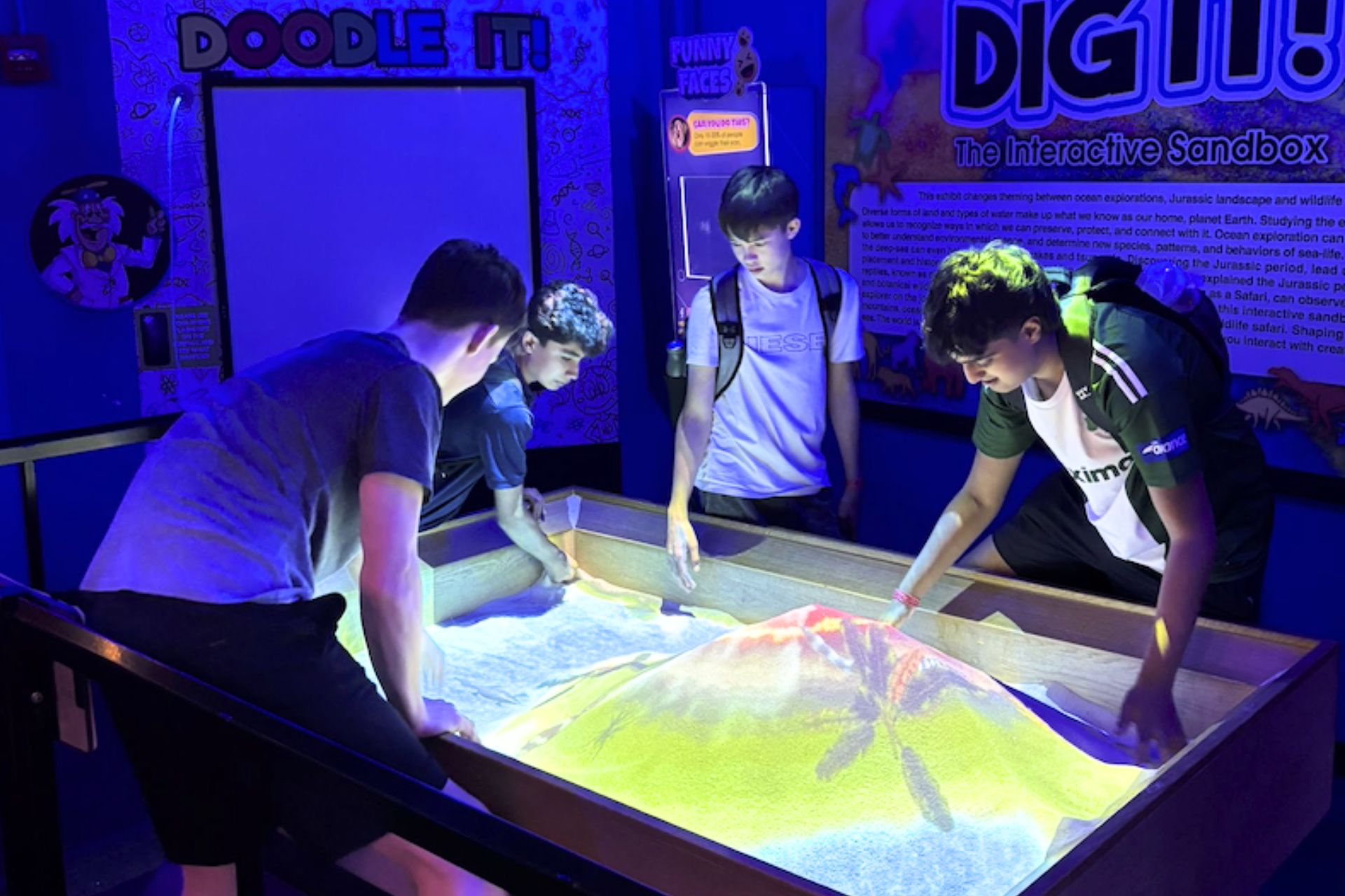 St Albans students exploring an interactive sandbox