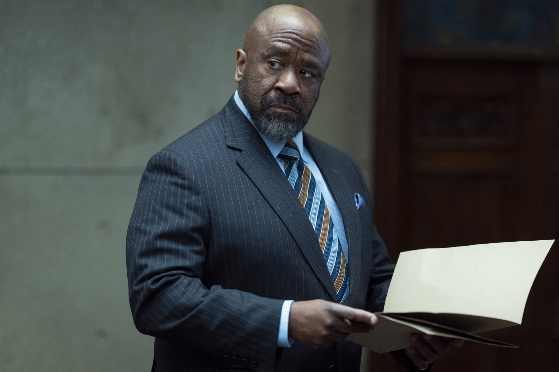 Lucian Msamati as Kofi in Hostage