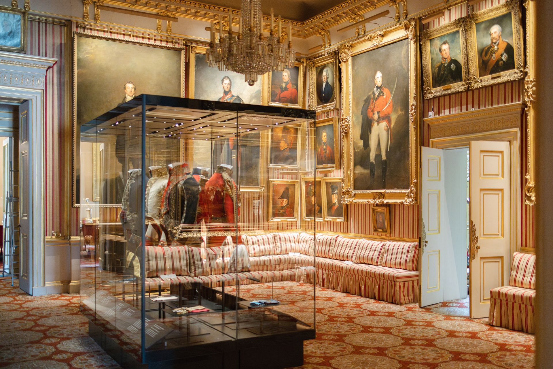 Art gallery with a glass case containing cavalry uniforms