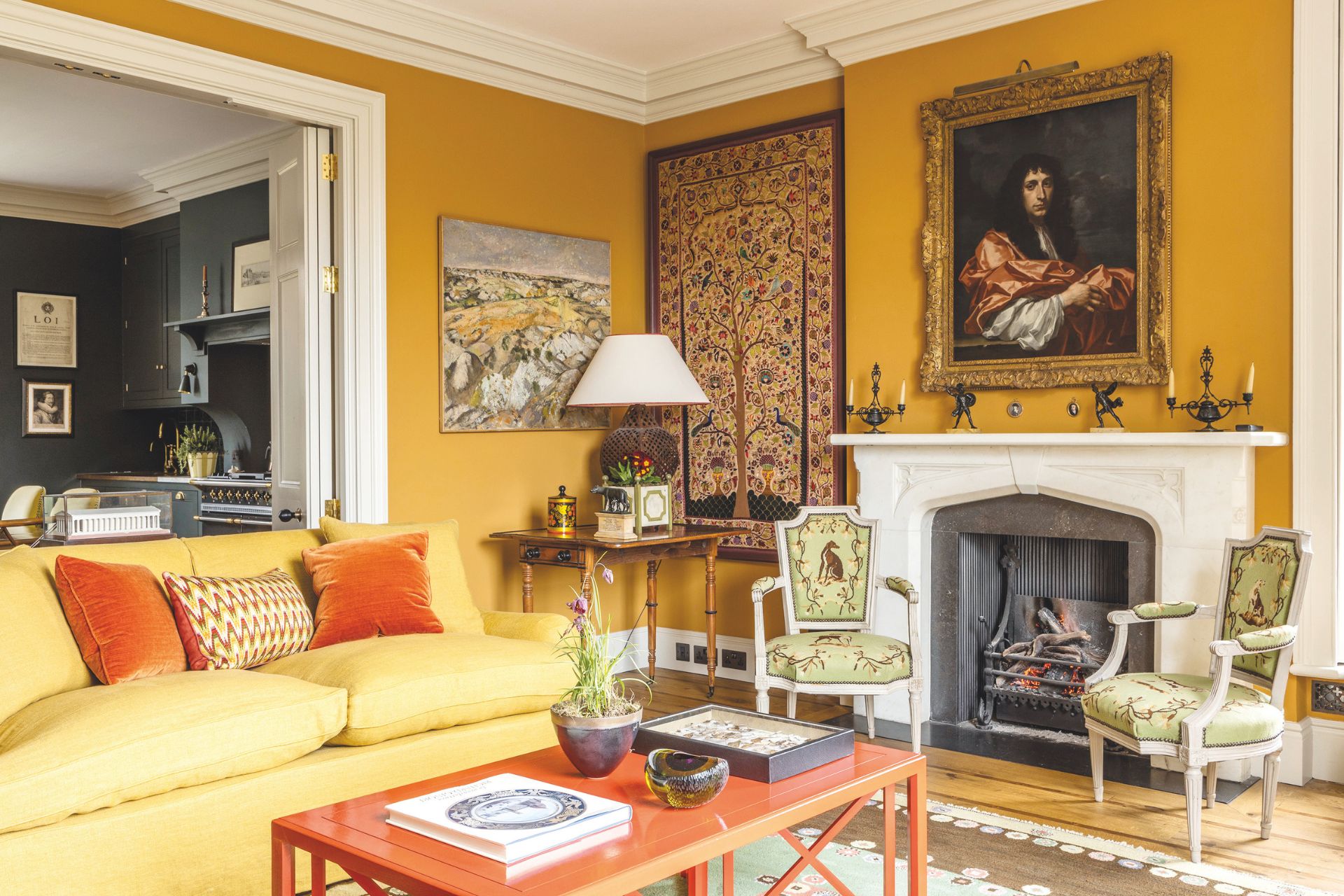 Sunflower yellow living room with white marble fireplace and yellow sofas
