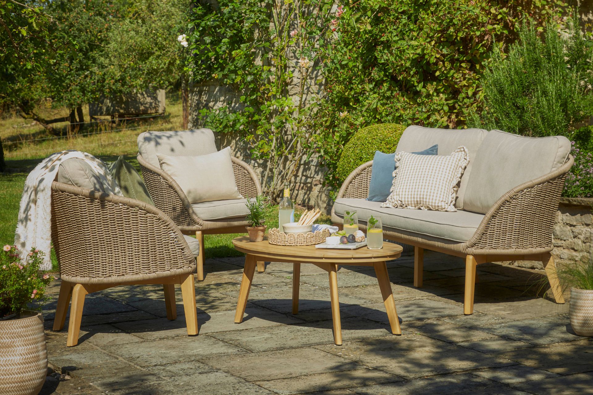 Curved rattan outdoor furniture set