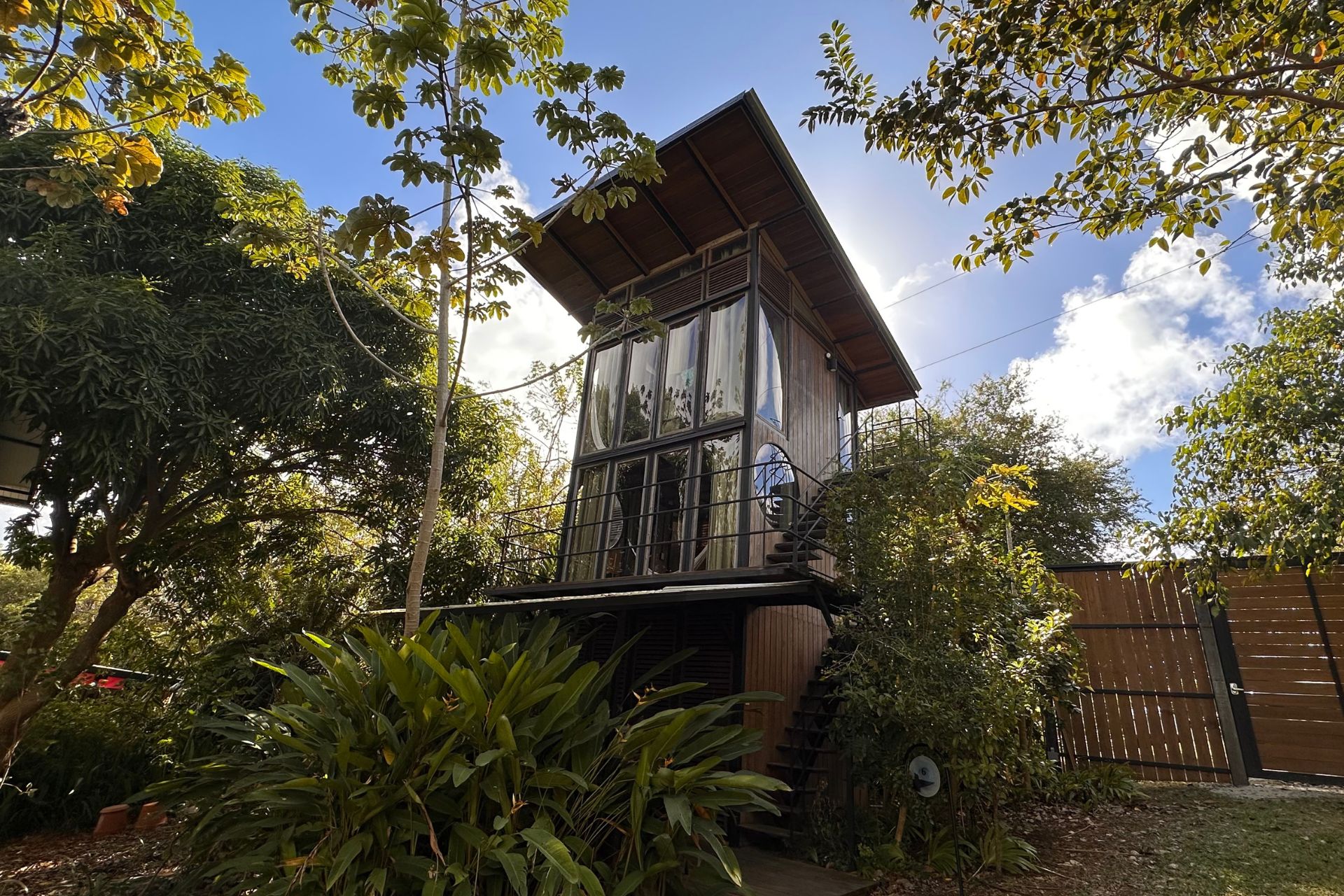 Modern treehouse with floor-to-ceiling windows