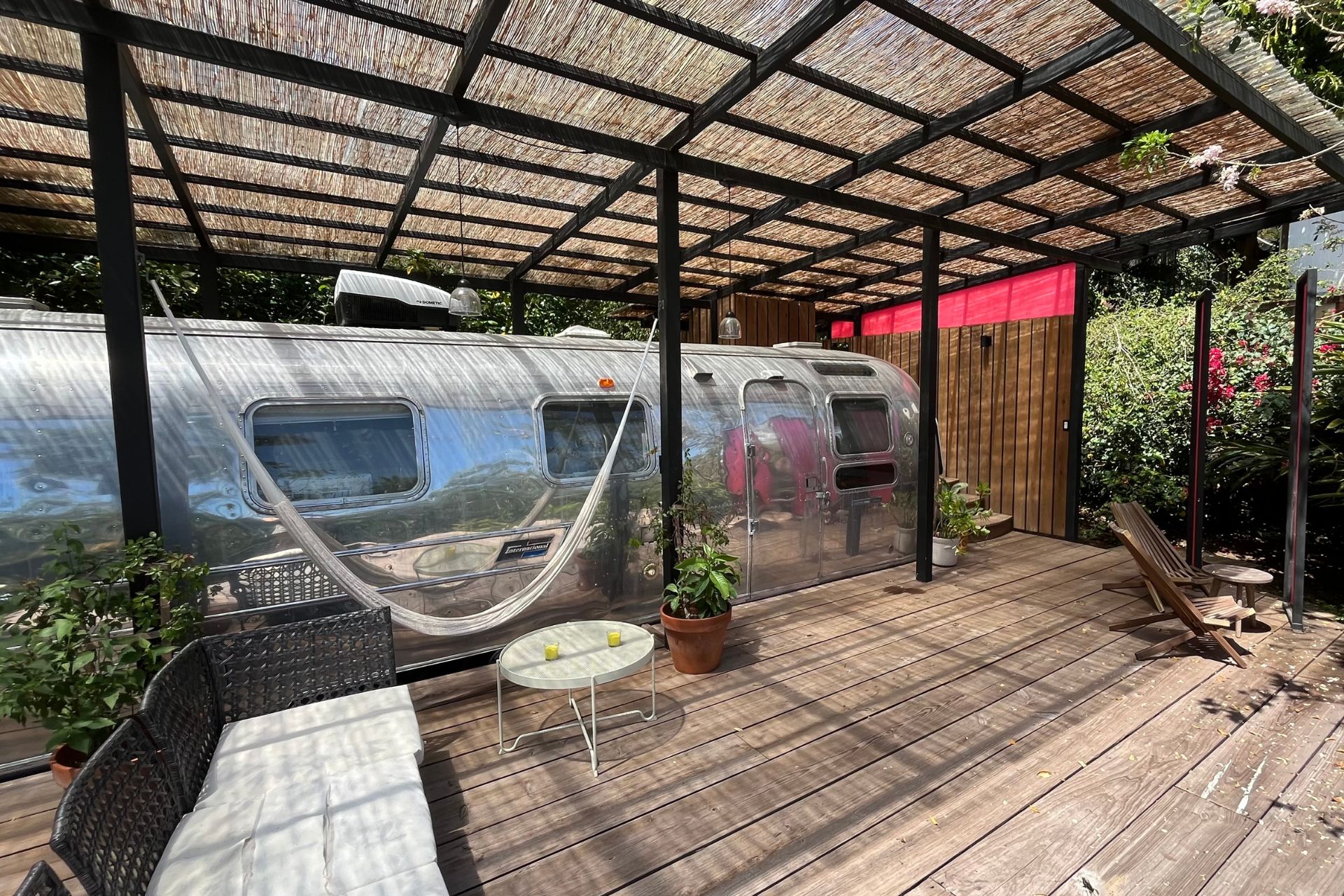 Vintage airstream with white hammock