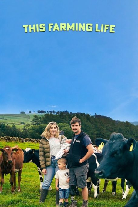 A couple with a babe in arms and small child on a farm, against a clear blue sky with the text 'This Farming Life'