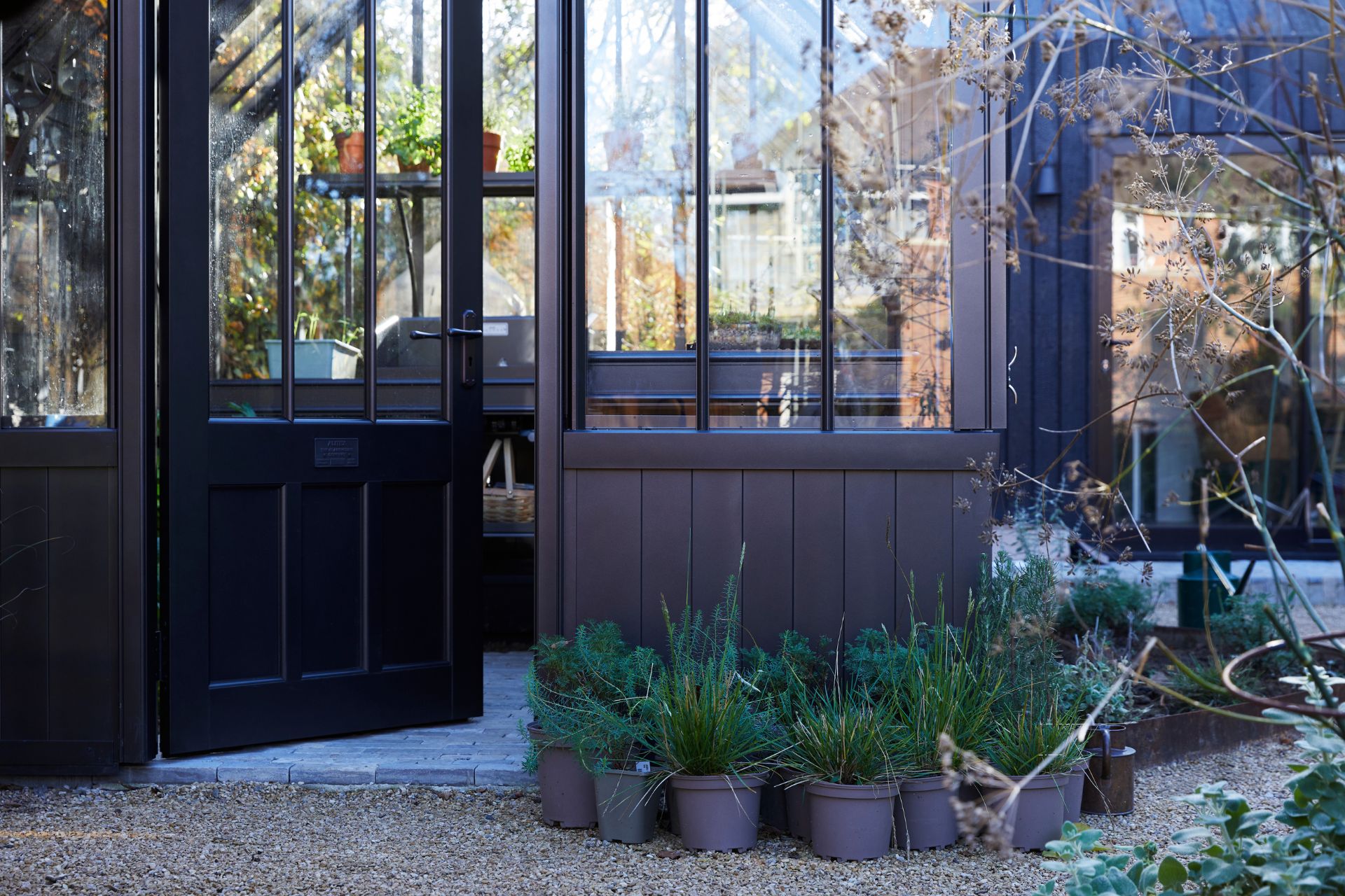 Greenhouse with black timber frame