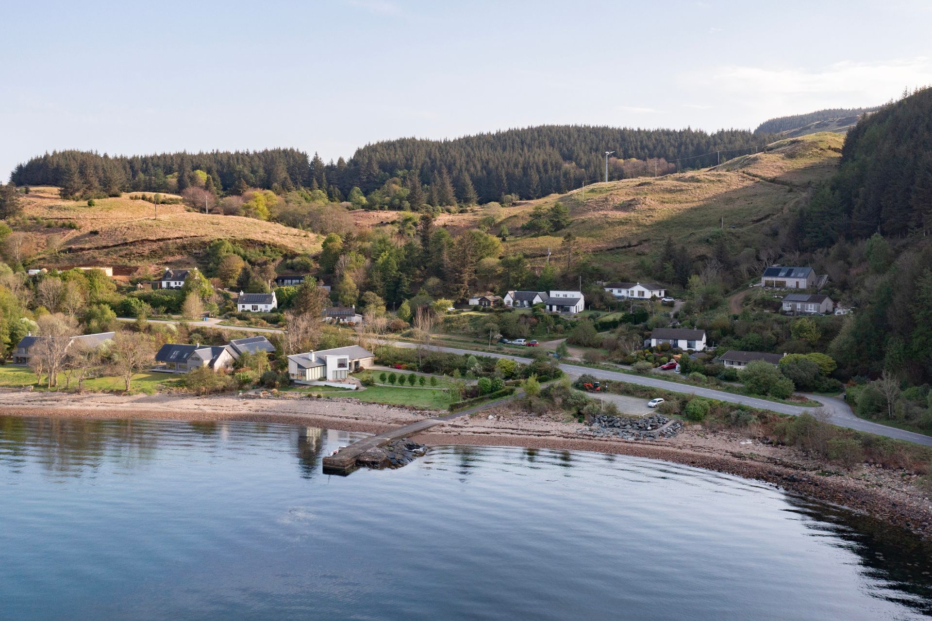 Scottish island with houses and lake