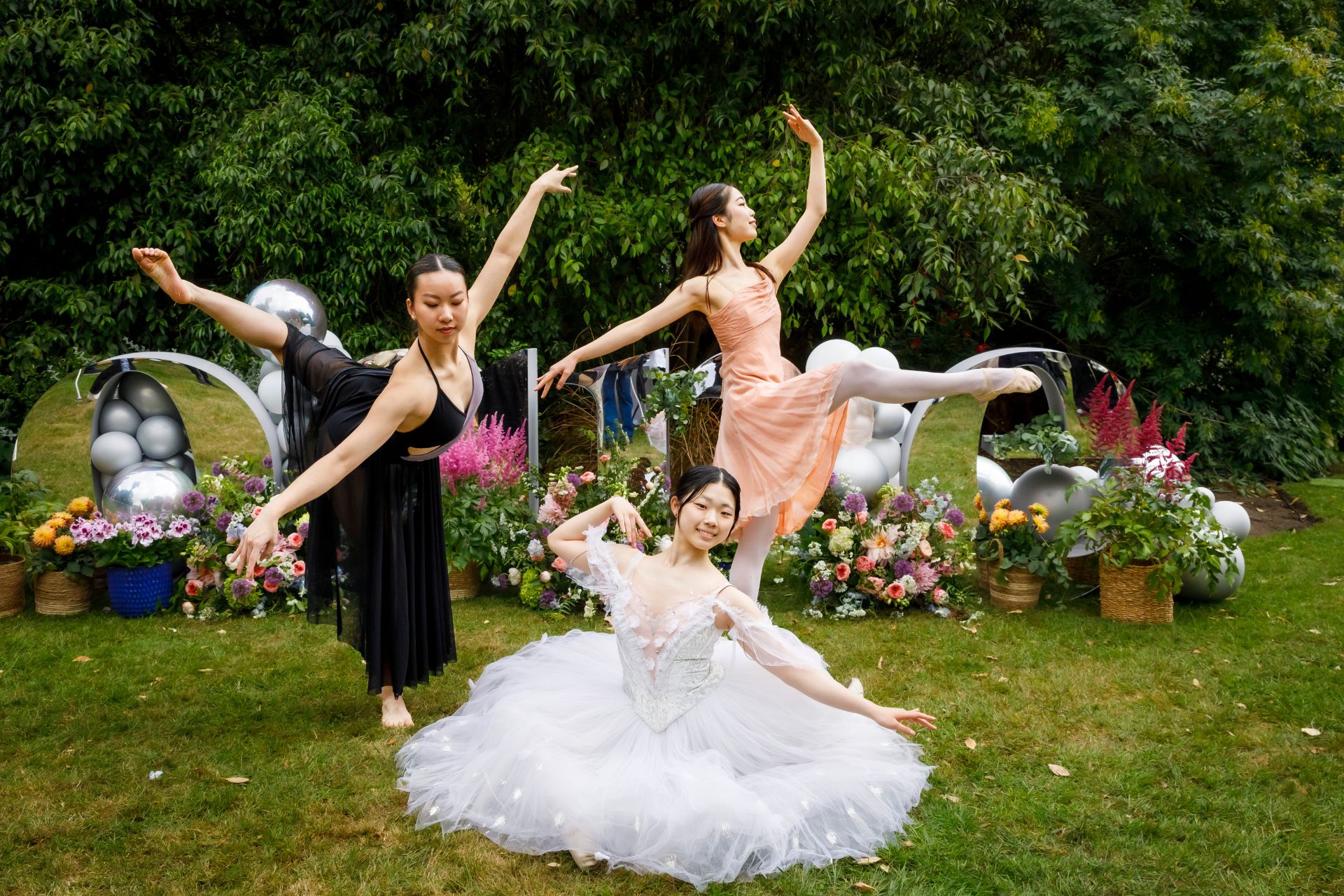 Ballet dancers performing in a private garden