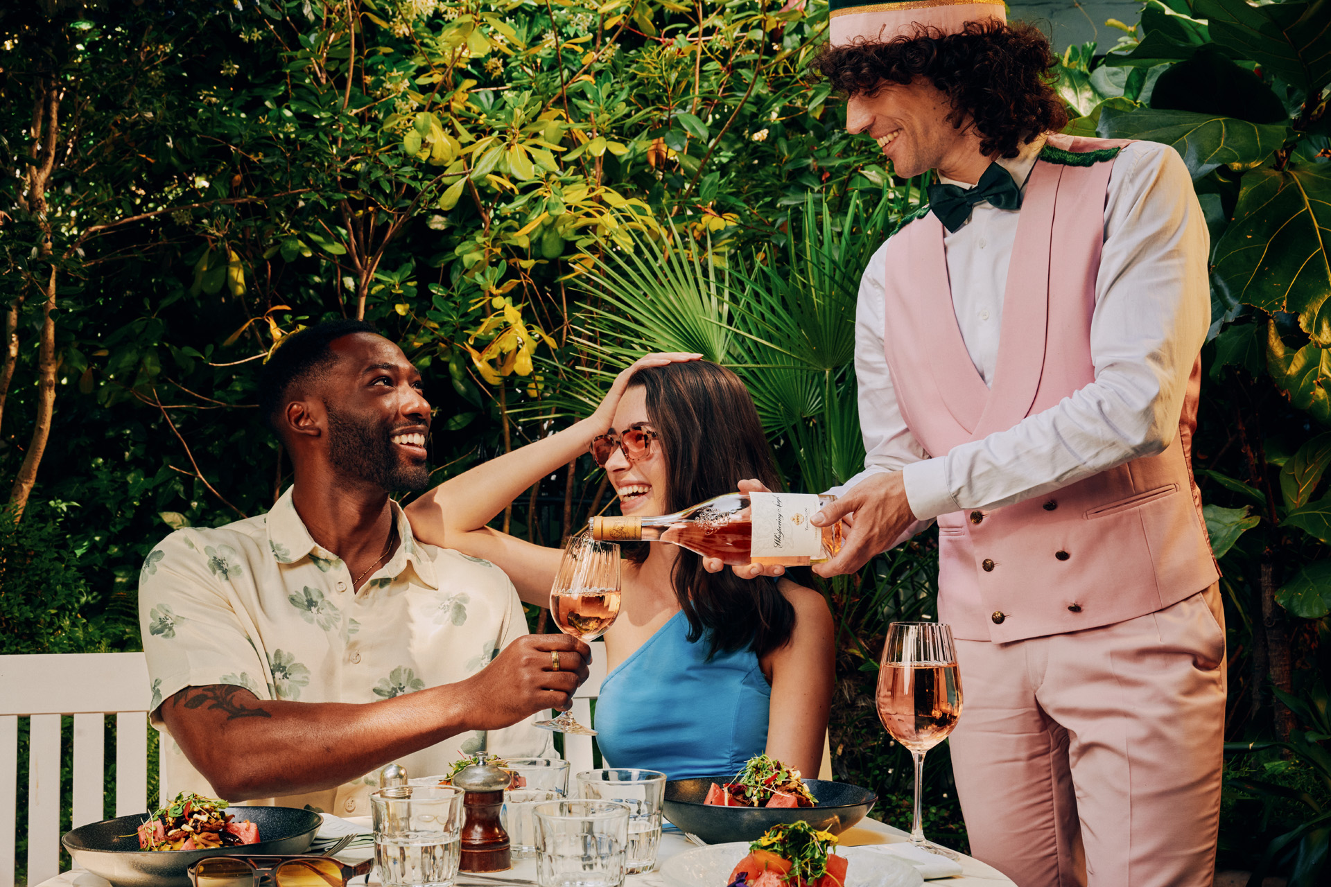 A couple being served rose