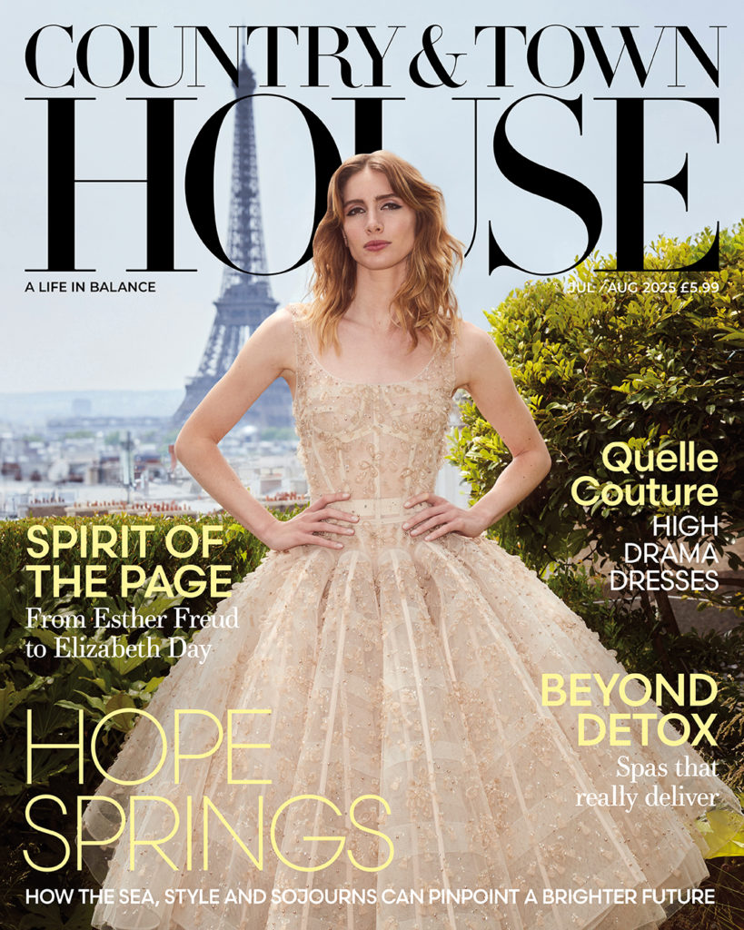 Model wearing couture gown with Paris in the background