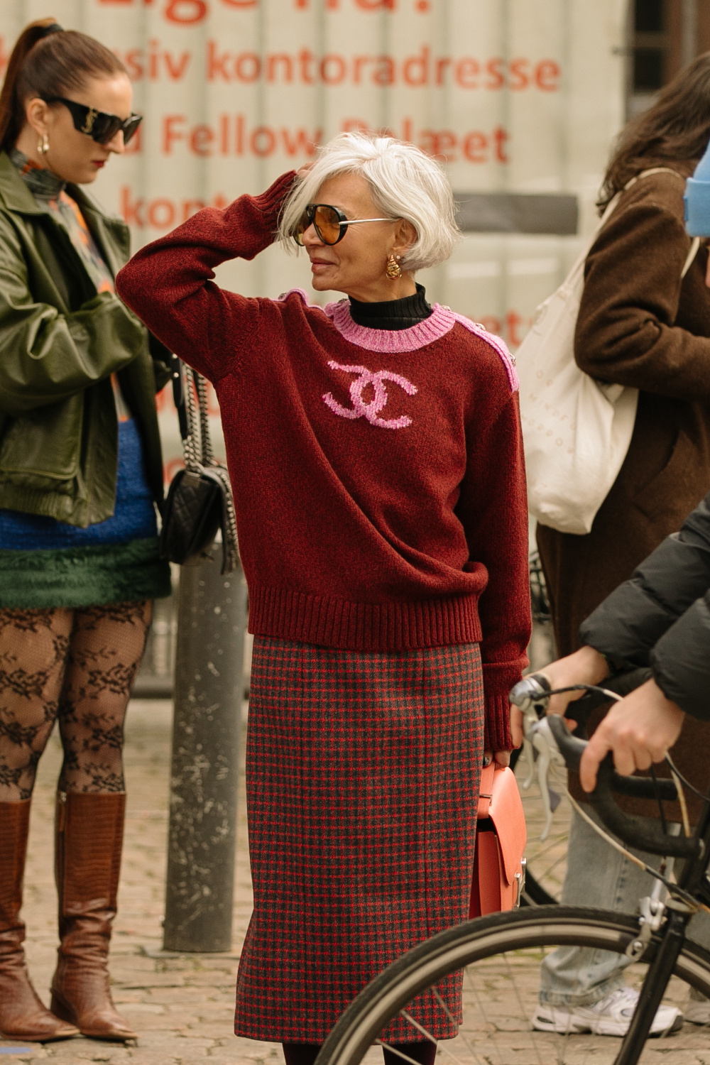 Woman with standing on pavement