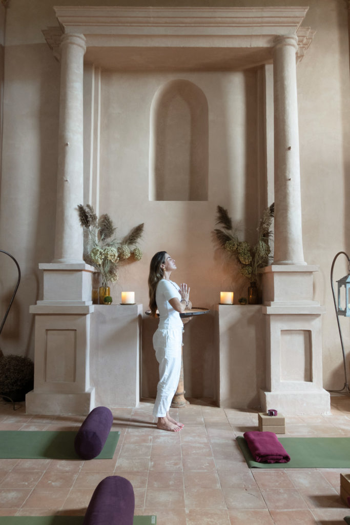 Fee Drummond doing yoga at Reschio in Umbria