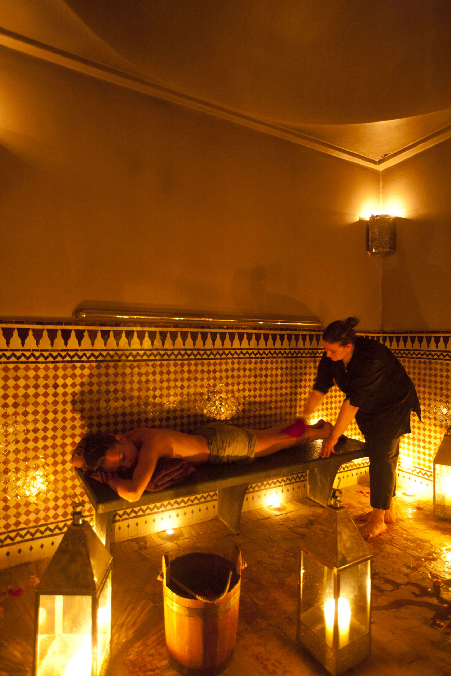 A person receives a massage in the hammam